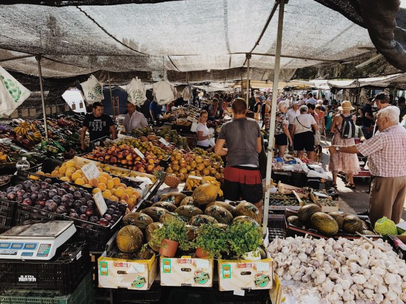 Food Markets - group of people at the vegetable market