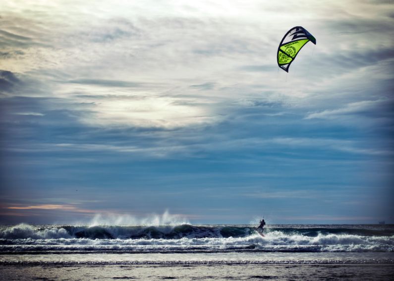 Kite Surfing - person riding surfboard